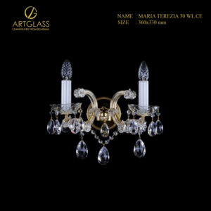 Đèn tường pha lê MARIA TEREZIA 30 WL CE thiết kế cổ điển tinh xảo, kết hợp giữa đồng thau mạ vàng và chuỗi pha lê trong suốt, tạo nên ánh sáng phản chiếu lấp lánh đặc trưng của nghệ thuật Bohemia.