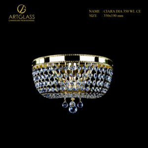 Đèn tường pha lê CIARA DIA 350 POLISHED CE hai bóng 40W với khung đồng thau mạ vàng, pha lê cao cấp CH Séc phản chiếu ánh sáng lấp lánh, tạo điểm nhấn sang trọng cho không gian nội thất.