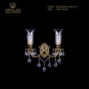 Đèn tường pha lê MILAGROS II WL CE chính hãng Artglass với 2 bóng nến, khung làm từ đồng thau mạ vàng và trang trí bằng các dải pha lê cao cấp.